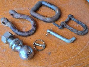 lot 224 image: Curt 2-516 Inch Trailer Hitch Ball, Shackles, and Pins