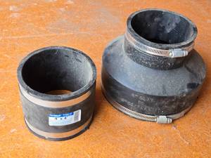 lot 260 image: PlumbQwik Fernco 4 x 4 and 6 Clay to 4 CIPlastic Couplings