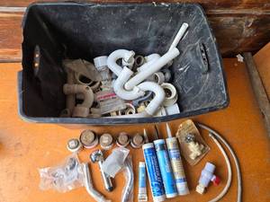 lot 261 image: Assorted Plumbing and Sealant Supplies including PVC Pipes and Silicone Sealant