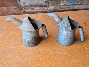 lot 303 image: Vintage NYC-PA Approved Type One Quart Oil Cans
