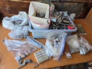 lot 373 image: Assorted Hardware and Fasteners including Sliding Door Hardware, Knobs, Toggle Bolts and Various Screws
