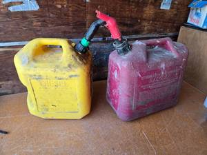 lot 384 image: Yellow Diesel Fuel Can and Red Gasoline Fuel Can