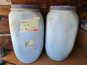 lot 388 image: Large Plastic Storage Barrels with Lids about 29 Tall