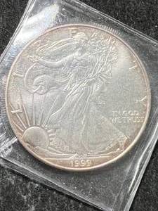 lot 34 image: 1999 AMERICAN SILVER EAGLE 1 TROY OZ .999 FINE SILVER