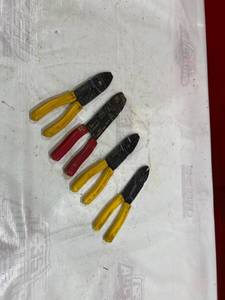 lot 377 image: Four Wire Crimping and Stripping Pliers with Yellow and Red Handles