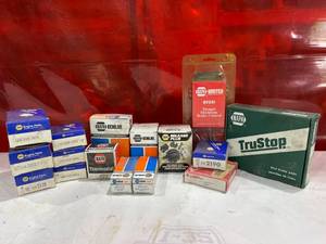 lot 117 image: NAPA Automotive Parts, Including Brake Pads, Thermostats, and Sensors