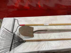 lot 217 image: Garden Tools Lot with Shovel, Steel Rake, and Leaf Rake