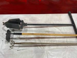 lot 218 image: Three Farm and Garden Tools, Including Post Hole Digger