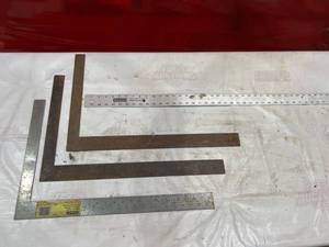 lot 219 image: Four Metal Carpenter Squares with Measurement Markings