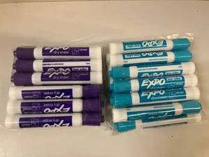 lot 104 image: Purple and Turquoise Dry Erase Markers