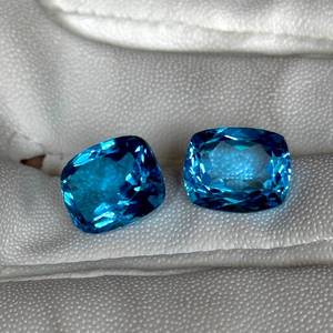 lot 27C image: 13.82 Carat Total Natural Blue Topaz Pair  Cushion Cut Estimated Retail $1,200$1,800 VIDEO