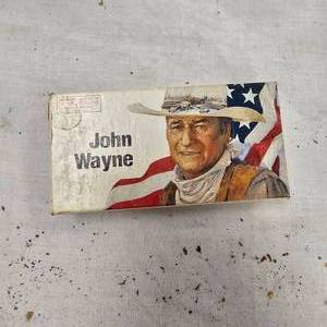 lot 74 image: Commemorative John Wayne 32-40 Winchester Shells