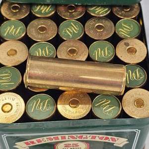 lot 117 image: Remington Ducks Unlimited Brass 12 ga Commemorative