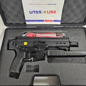 lot 172 image: UTAS 9mm Pistol, UT9m-mini , uses Glock Mags, Comes w2-30rd Mags, as new