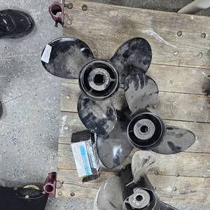 lot 256 image: 3 Aluminum Merc Props(2 in like new condition)