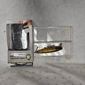 lot 221 image: Zippo, as new, Hand Warmer and Vintage Diver Lure