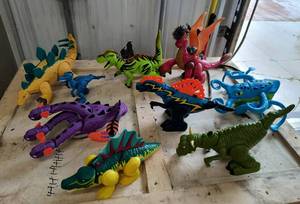 lot 26 image: Large lot of dragons, some are mechanical, battery operated