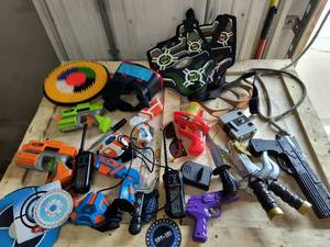 lot 33 image: Lot of toys - swords, nerf guns, SpyNet laser guns, etc