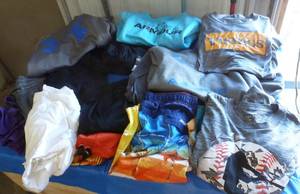 lot 51 image: Lot of mostly boys large tshirts, shorts, hoodies