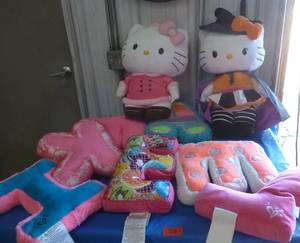 lot 53 image: Two 2-ft tall Hello Kitty and plush letters