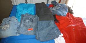 lot 69 image: Girls lot of clothes Jeans jackets, pants, shirts