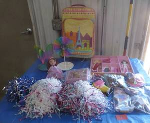 lot 71 image: Girls luggage bag, pom poms(some make sound), dolls and jewelry holders