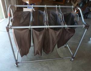 lot 76 image: Laundry storage, toy storage etc on wheels