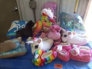 lot 88 image: Girls slippers, pillows, plush and sleeping bag