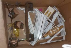 lot 94 image: Box of new shelf brackets and some dcor