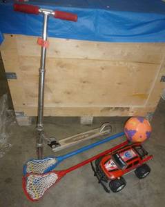lot 99 image: Razor scooter, lacrosse wands, ball and RC truck but no remote