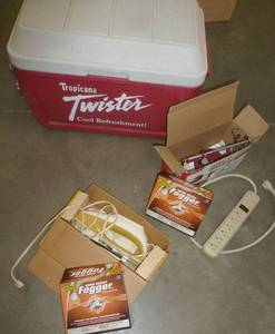 lot 107 image: Cooler, apple peeler, electric knife, insect foggers, outlet strip