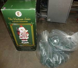 lot 114 image: Animated santa and two large groups of christmas lights and organizer bag with cards