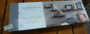 lot 22 image: Wall shelf and photo frame system
