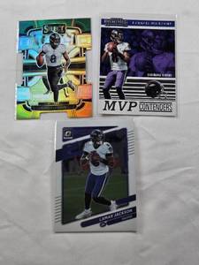 lot 161 image: Lot of 3 Lamar Jackson Cards Including a Die Cut Prizm