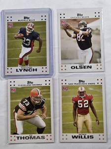 lot 194 image: Lot of 4 2007 Topps Rookie Football Cards Featuring Marshawn Lynch, Greg Olsen, Patrick Willis, and Joe Thomas