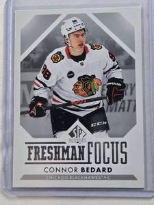 lot 208 image: Connor Bedard Rookie 2023-24 SP Authentic Freshman Focus #FF-1 - Chicago Blackhawks Hockey Card
