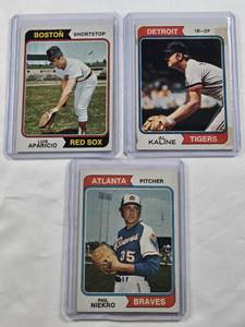 lot 244 image: Lot of 3 Vintage 1974 Topps Baseball Cards Featuring Al Kaline, Luis Aparicio, and Phil Niekro