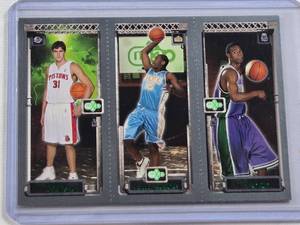 lot 247 image: 2004 Topps NBA Rookie Matrix Featuring Carmelo Anthony, Darko Milicic, and T.J. Ford