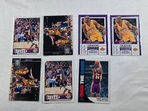 lot 248 image: Lot of 7 Kobe Bryant Basketball Cards Including Panini Contenders Season Ticket, Own the Game and Others