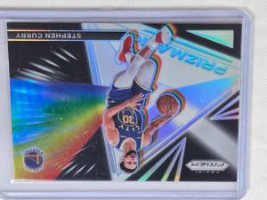 lot 257 image: Stephen Curry 2021-22 Panini Prizm Prizmatic Silver Holo #26 - Golden State Warriors Basketball Card