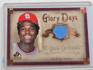 lot 262 image: Lou Brock 2005 SP Legendary Cuts Glory Days Jersey Relic #GD-LB - St. Louis Cardinals Baseball Card