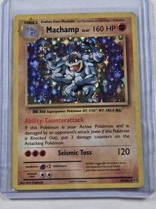 lot 312 image: Machamp Holo Pokemon Card 19108
