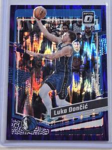 lot 345 image: Luka Doncic 2023-24 Panini Donruss Optic Purple Shimmer Prizm #67 - Dallas Mavericks Basketball Card