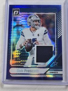 lot 389 image: Dak Prescott 2024 Panini Donruss Optic Threads Blue Hyper Prizm Relic #DTB-DPT - Dallas Cowboys Football Card