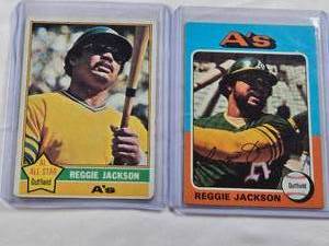 lot 450 image: Lot of 2 Reggie Jackson Vintage Baseball Cards 1976 #500, 1975 #300 - Oakland As