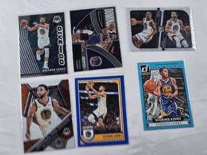 lot 453 image: Lot of 7 Stephen Curry Basketball Cards - Scoring Kings and Give and Go and Others