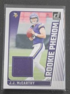 lot 33 image: 2024 Donruss Rookie Phenom JJ McCarthy Jersey Relic Rookie Card