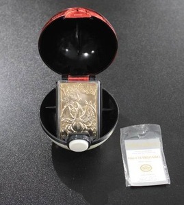 lot 75 image: 1999 Burger King Pokeball 23K Gold Charizard