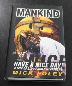 lot 83 image: Mankind Have a Nice Day Book w Mankind Autograph