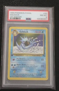 lot 205 image: 1999 Pokemon Fossil 1st Edition Golduck #3562 PSA 8